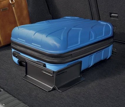 suitcase held securely by cargo elements