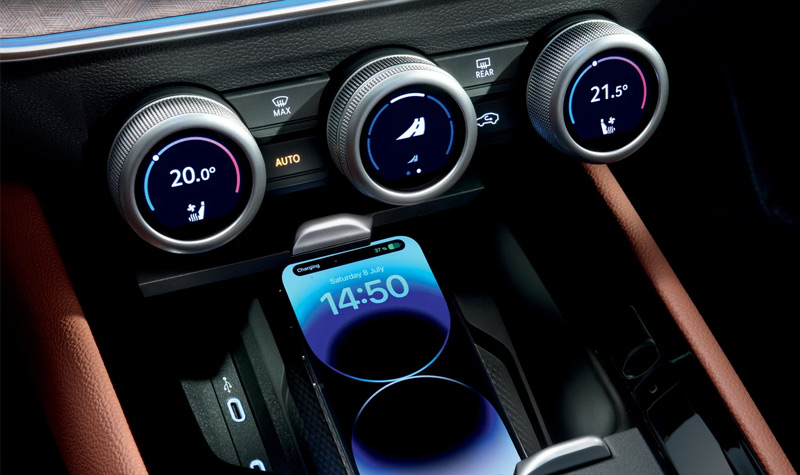 phone in a charging box in a Skoda